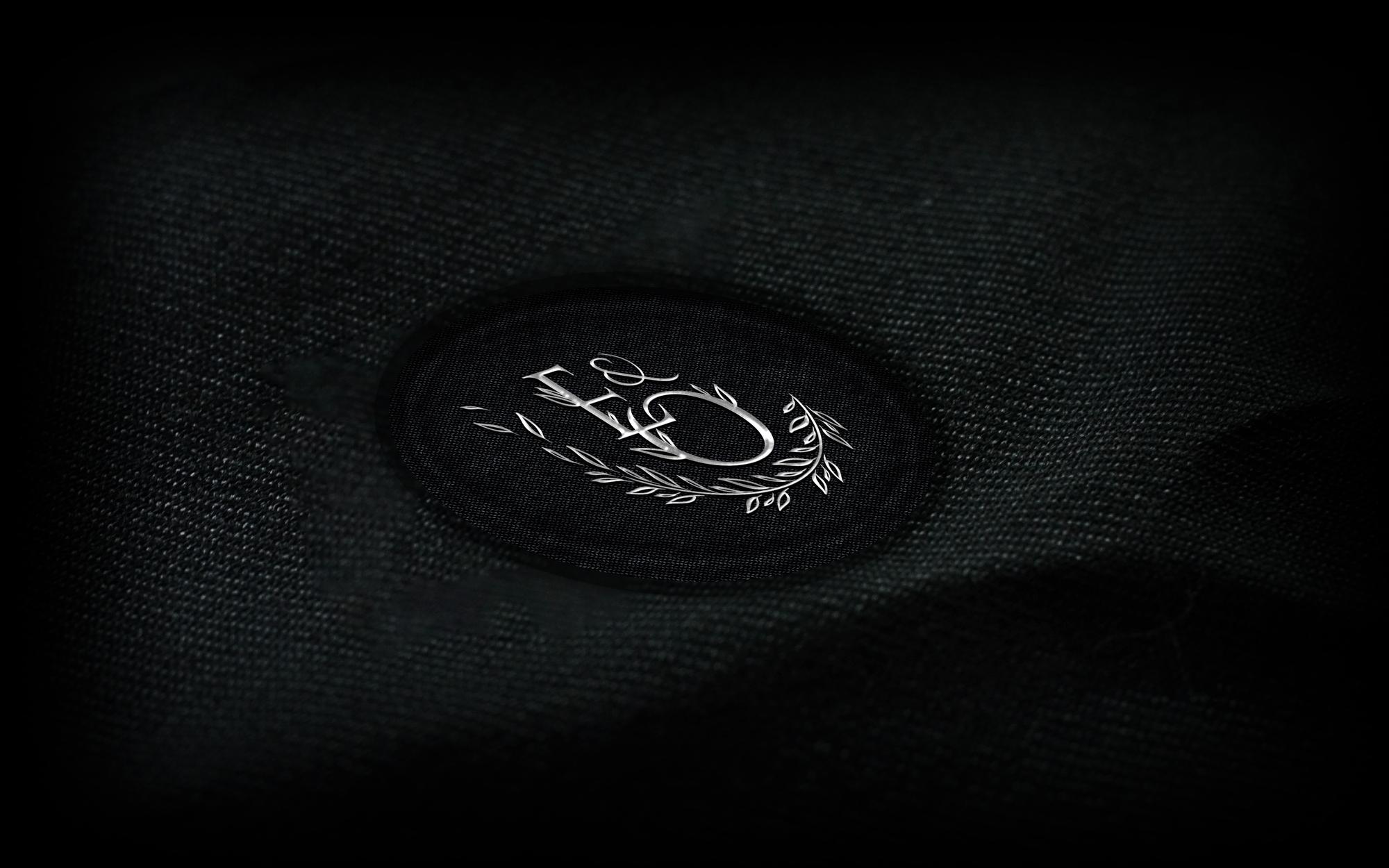 Finished embroidered emblem on a jacket
